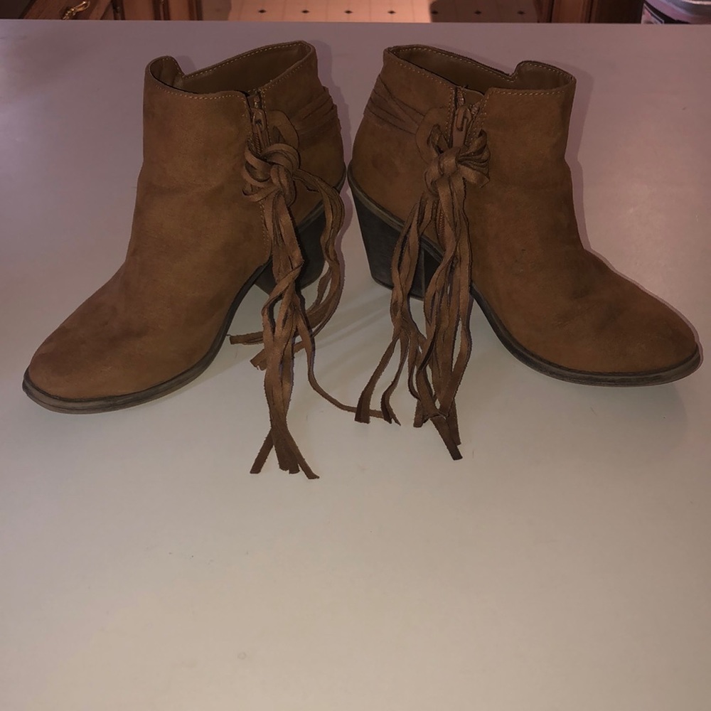 4/$35 Brown high heel boots. Size (8) in women’s.